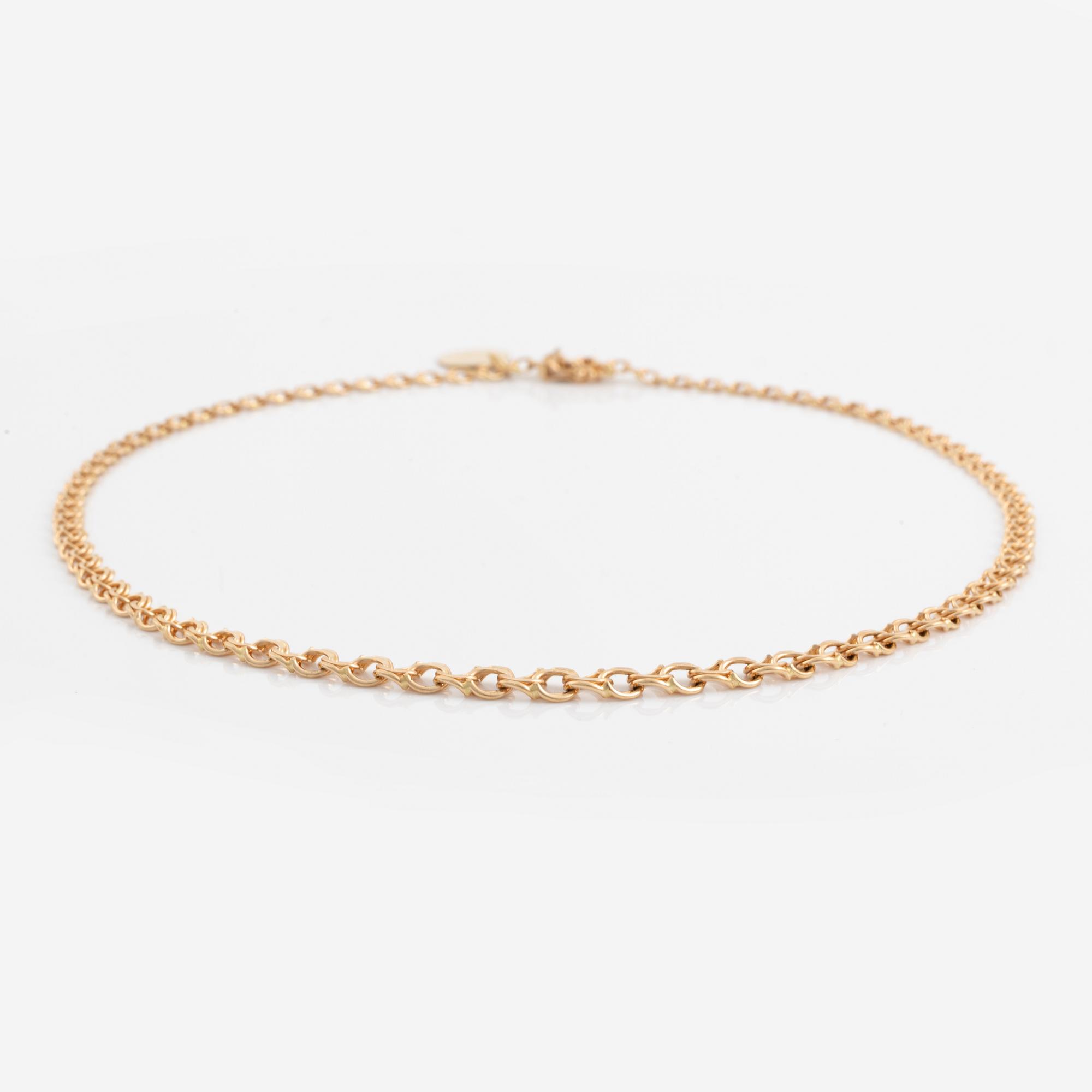 Collier 18K guld, doserad bismarck, med berlock.