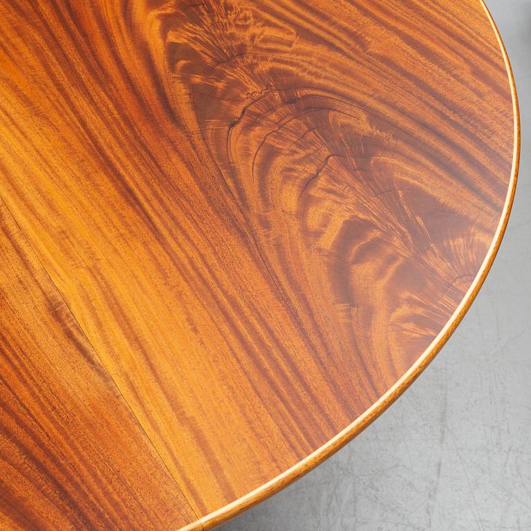 A model 771 mahogany dining table by Josef Frank for Firma Svenskt Tenn.