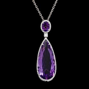 An amethyst, 20.70 cts, and brilliant cut diamond pendant, tot. 0.56 cts.