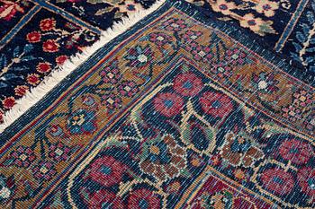 A carpet, an antique/a semi-antique Yezd, ca 557-562 x 366,5-370,5 cm.