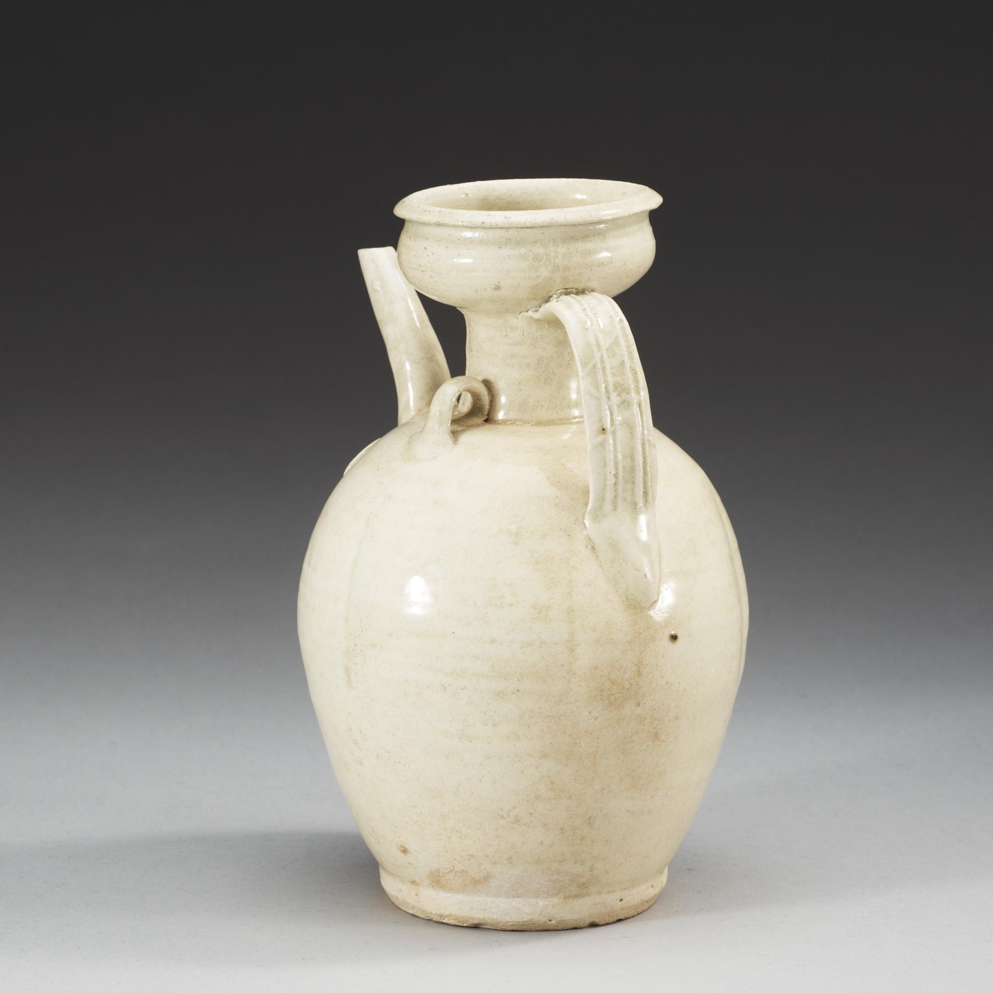 A pale celadon glazed ewer, Yuan dynasty (1271-1368).