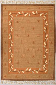 A 1920s Finnish flat weave carpet probably for Kotiteollisuus Oy Orkamo. Circa 340x245 cm.