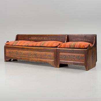 A traditional folk art sofa dated 1852.