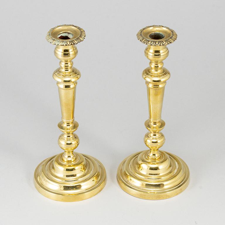 A pair of bronze candlesticks, first half of the 19th century.