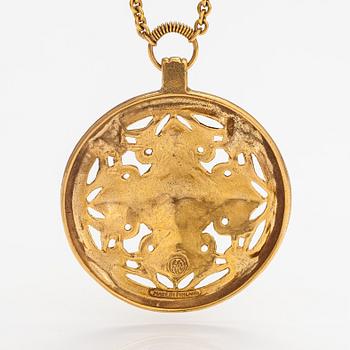 A gilded bronze neckalce "Åland pendant", model no. 67. Kalevala koru, Helsinki.