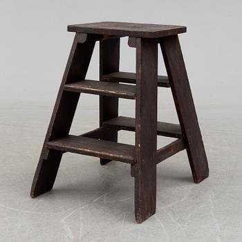 a late 19th century pinewood stool.