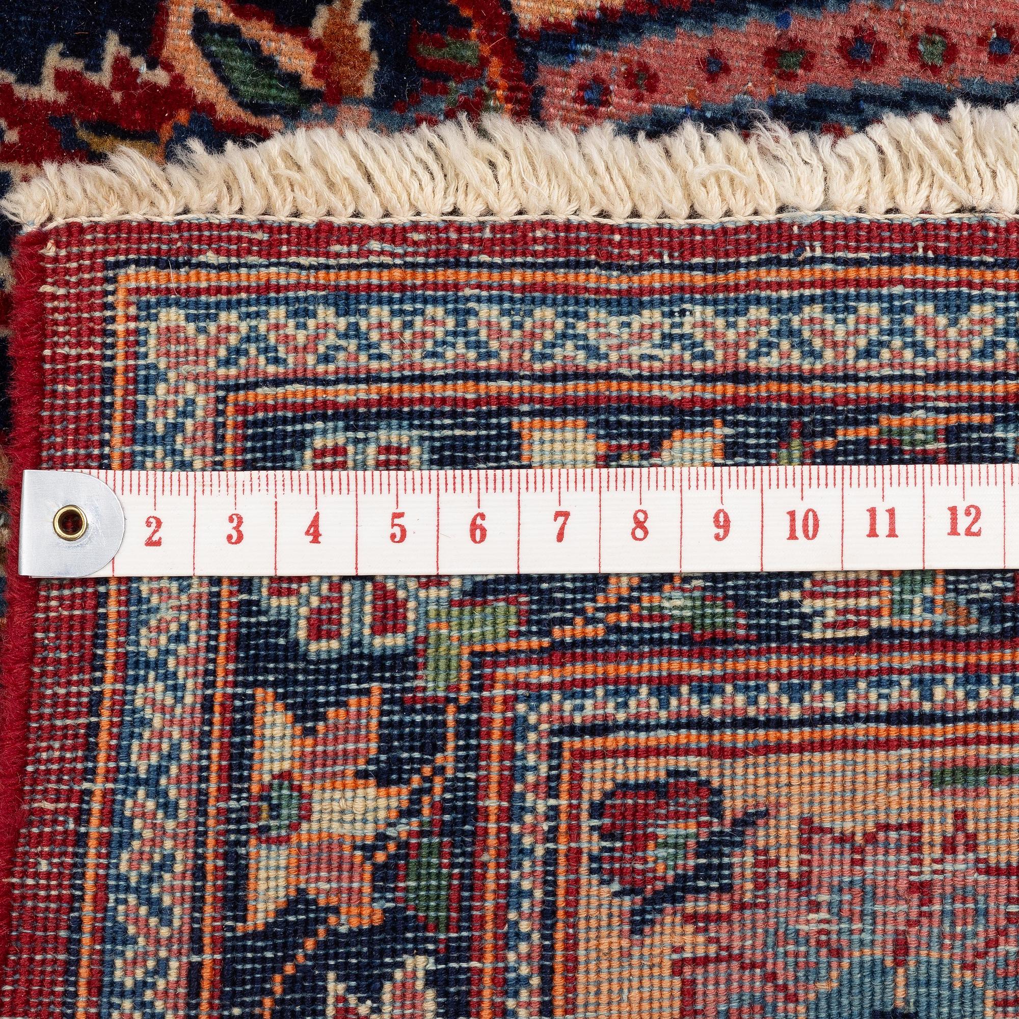 A semi-antique Keshan rug, c. 216 x 137 cm.