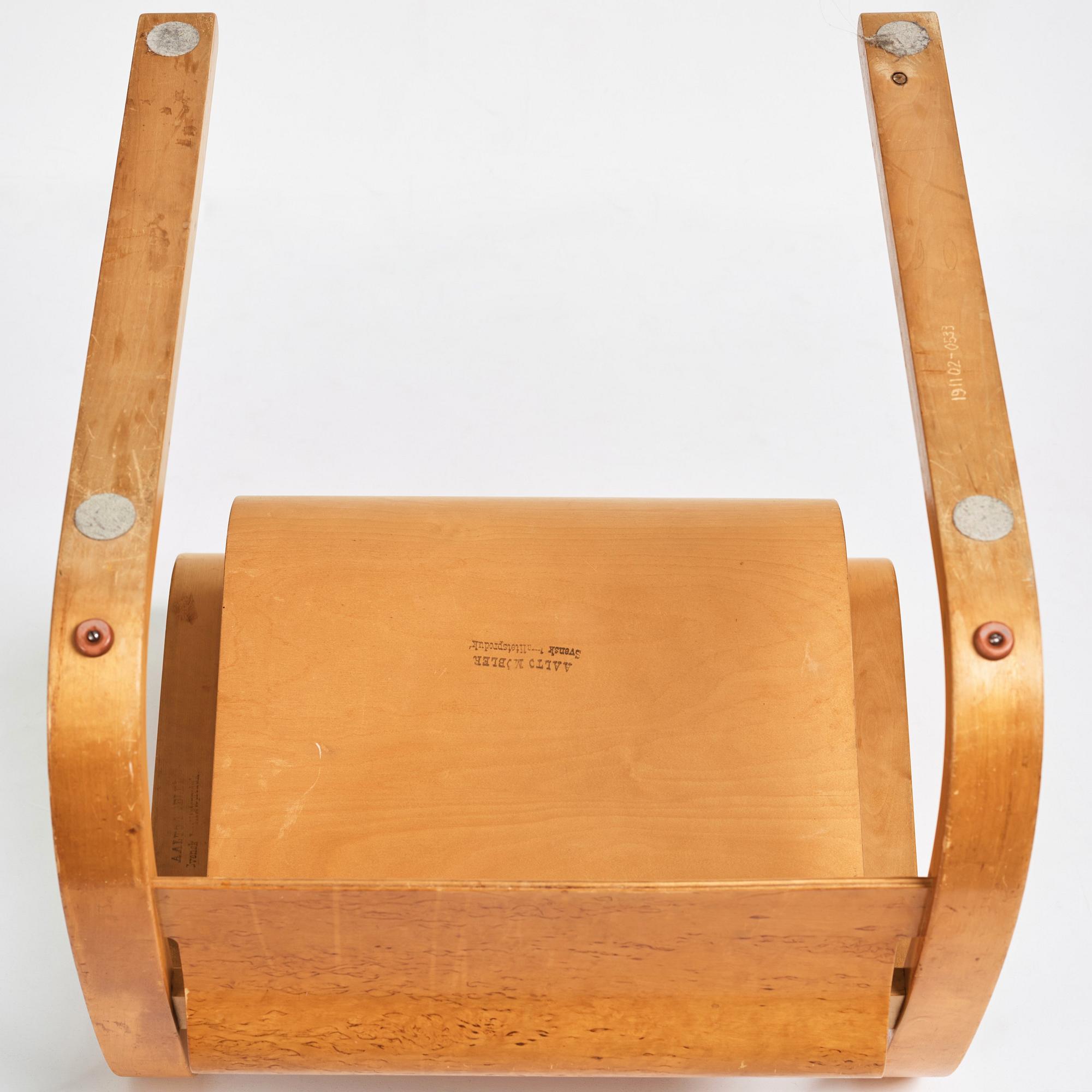 Alvar Aalto, a model nr 31 birch armchair, executed on license by Aalto Design Hedemora, Sweden 1945-54.