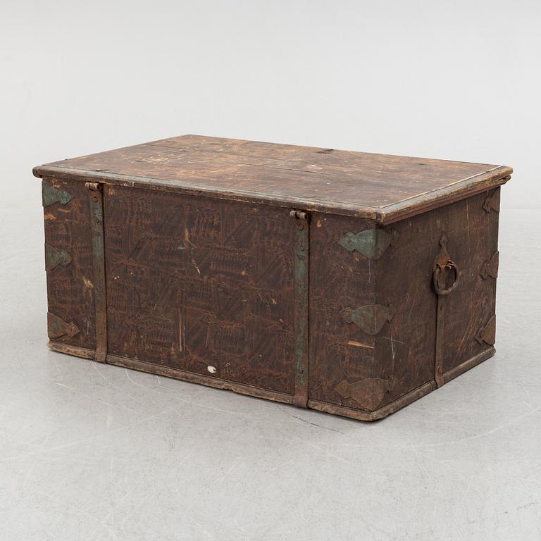 a 18th century wooden chest.