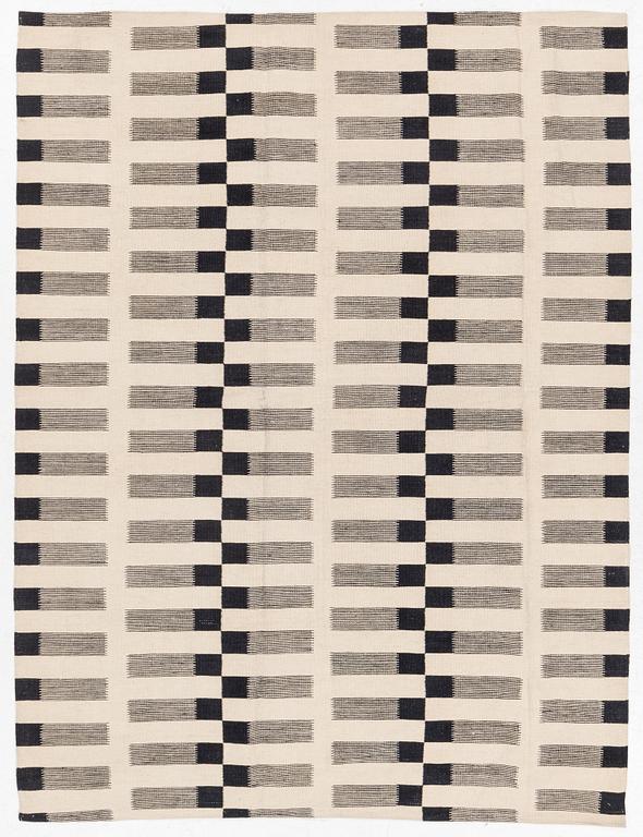 A flat-woven rug, c. 232 x 175 cm.