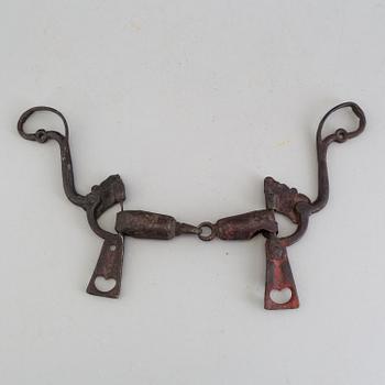 A wrought iron horse bridle 17th century.