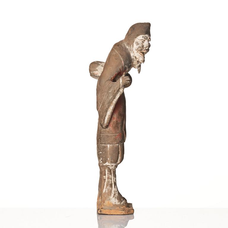 A sculptured pottery figure of a foreigner, Wei/Sui dynasty.