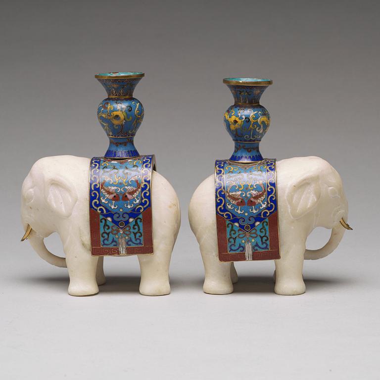 A pair of cloisonné and marble elephant candle holders, late Qing dynasty, about 1900.