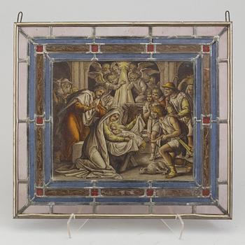 A pair of stained glass windows, circa 1900.