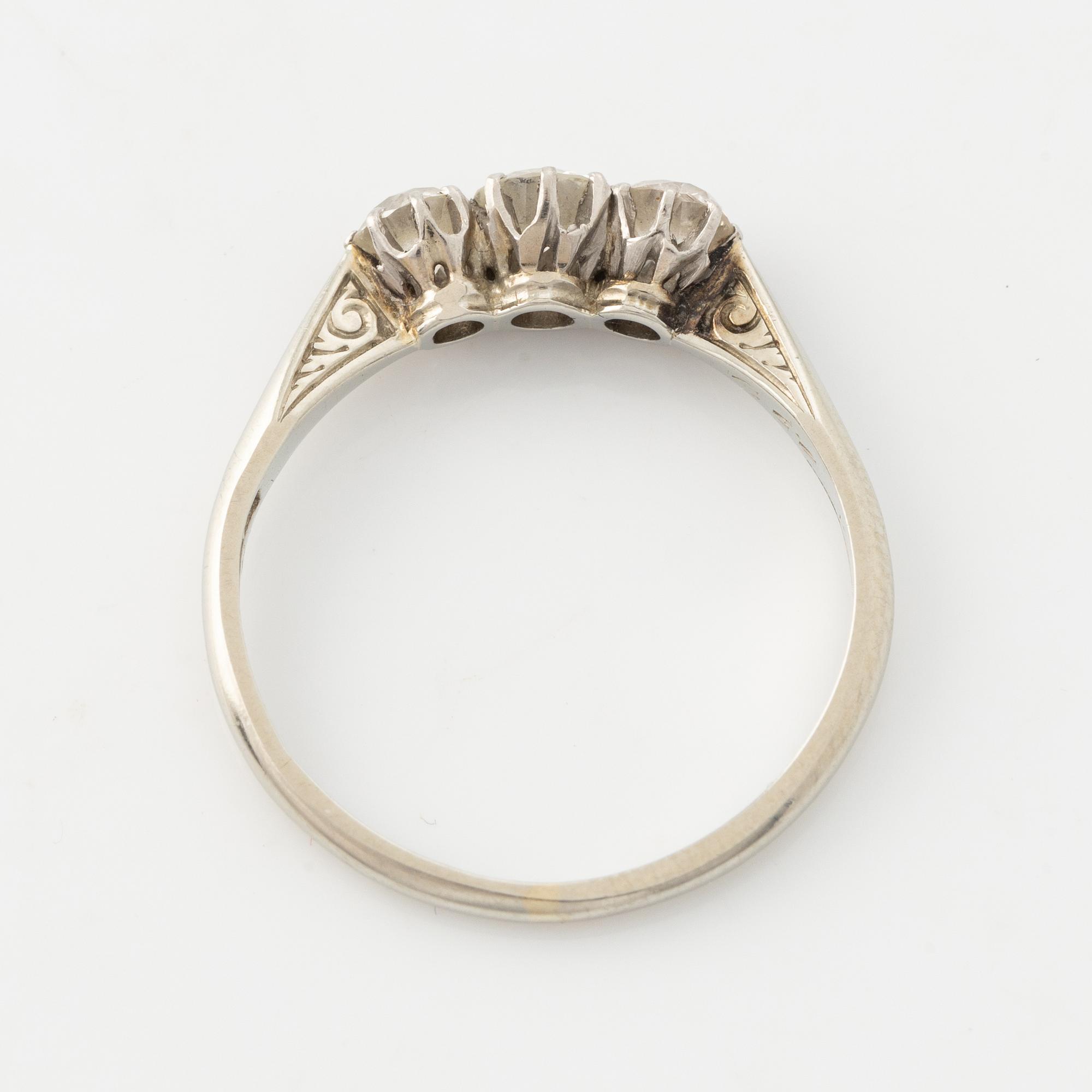 18K white gold and brilliant cut diamond three stone ring.