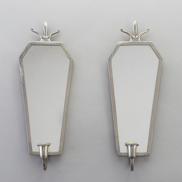 A Swedish mirror and a pair of wall sconces, 1920s / 30s.