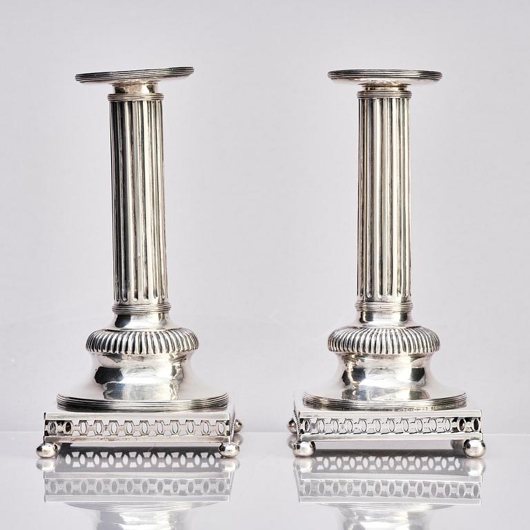 A pair of Swedish 18th century Gustavian silver candlesticks, marks of Arvid Floberg, Stockholm 1799.