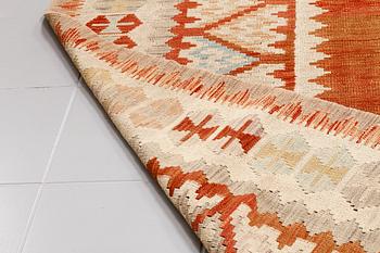 A kelim rug, 290 x 198 cm.