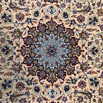 A semi-antique Isfahan rug, central Persia, signed c. 238 x 165 cm.