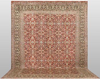 A Kirman lavar carpet, 403 x 304 cm.