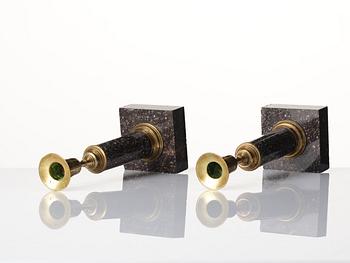 A pair of late Gustavian gilt-brass and 'Blyberg' porphyry candlesticks, Stockholm, circa 1800.