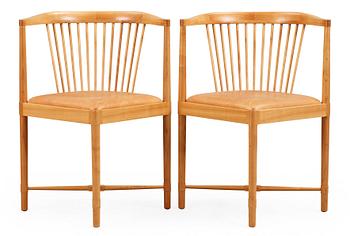 90. Børge Mogensen, A pair of Børge Mogensen 'Ruder Konge' cherry and beige leather chairs, Søborg Møbelfabrik, Denmark.