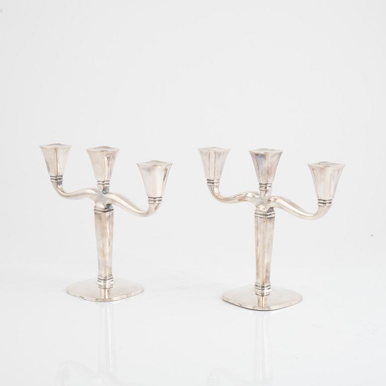 A pair of silver candlesticks, Swedish import marks, first half of the 20th Century.