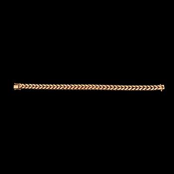 1307. A Stern gold bracelet.