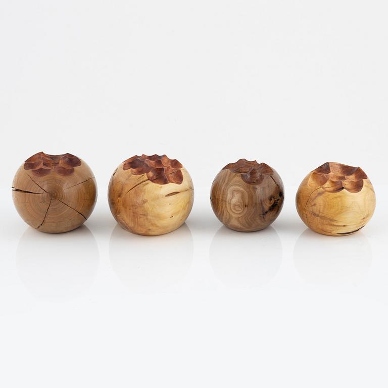 Magnus Ek, a set of four wooden appetize holders for Oaxen Krog.