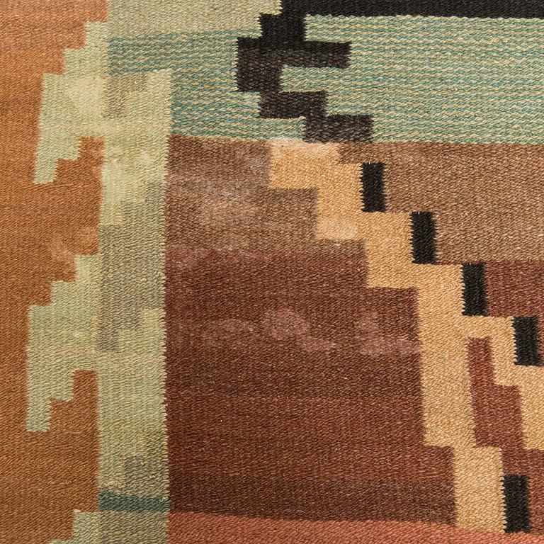 A 1930's Finnish flat weave carpet. Circa 300 x 205 cm.