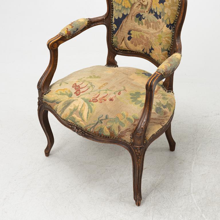 A pair of Rococo style armchairs, around 1900.