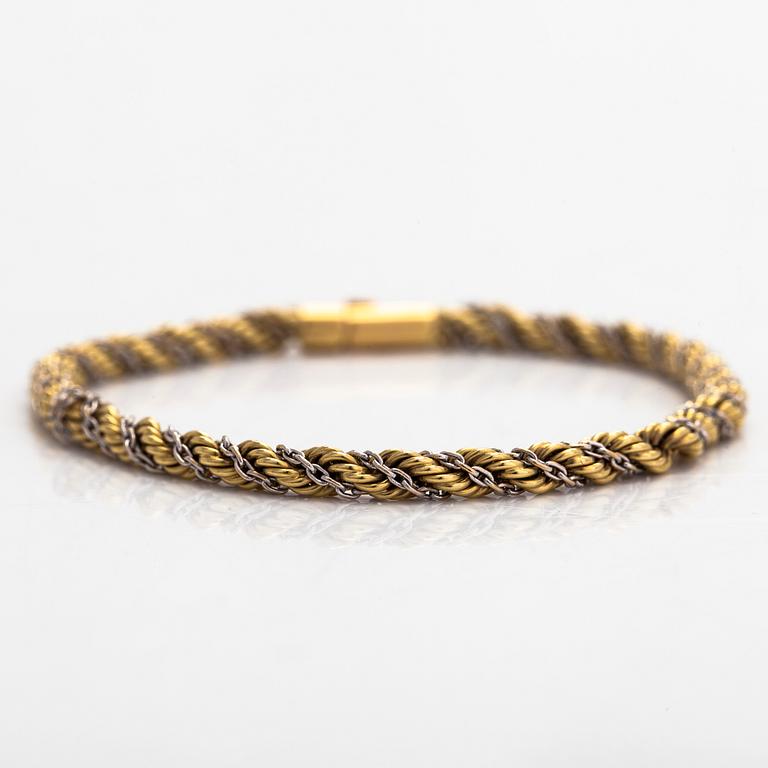 Armband, tvinnad cordellänk, 18K guld/vitguld. Utländsk stämpel.