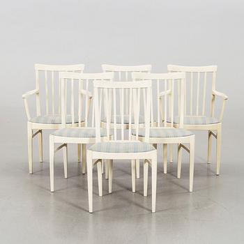A dining group of 7 pieces by Carl Malmsten for Bodafors from the second half of the 20th century.