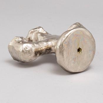 DAN WOLGERS, a silvergilt bronze candle stick, signed.