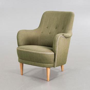 A "Samsas" armchair by Carl Malmsten.