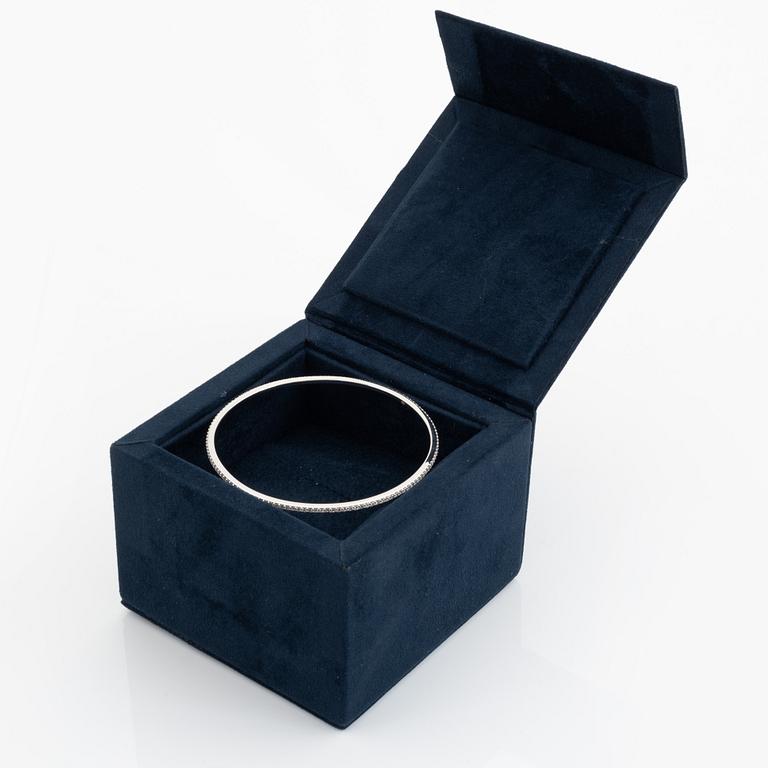 Brilliant cut diamond bangle.