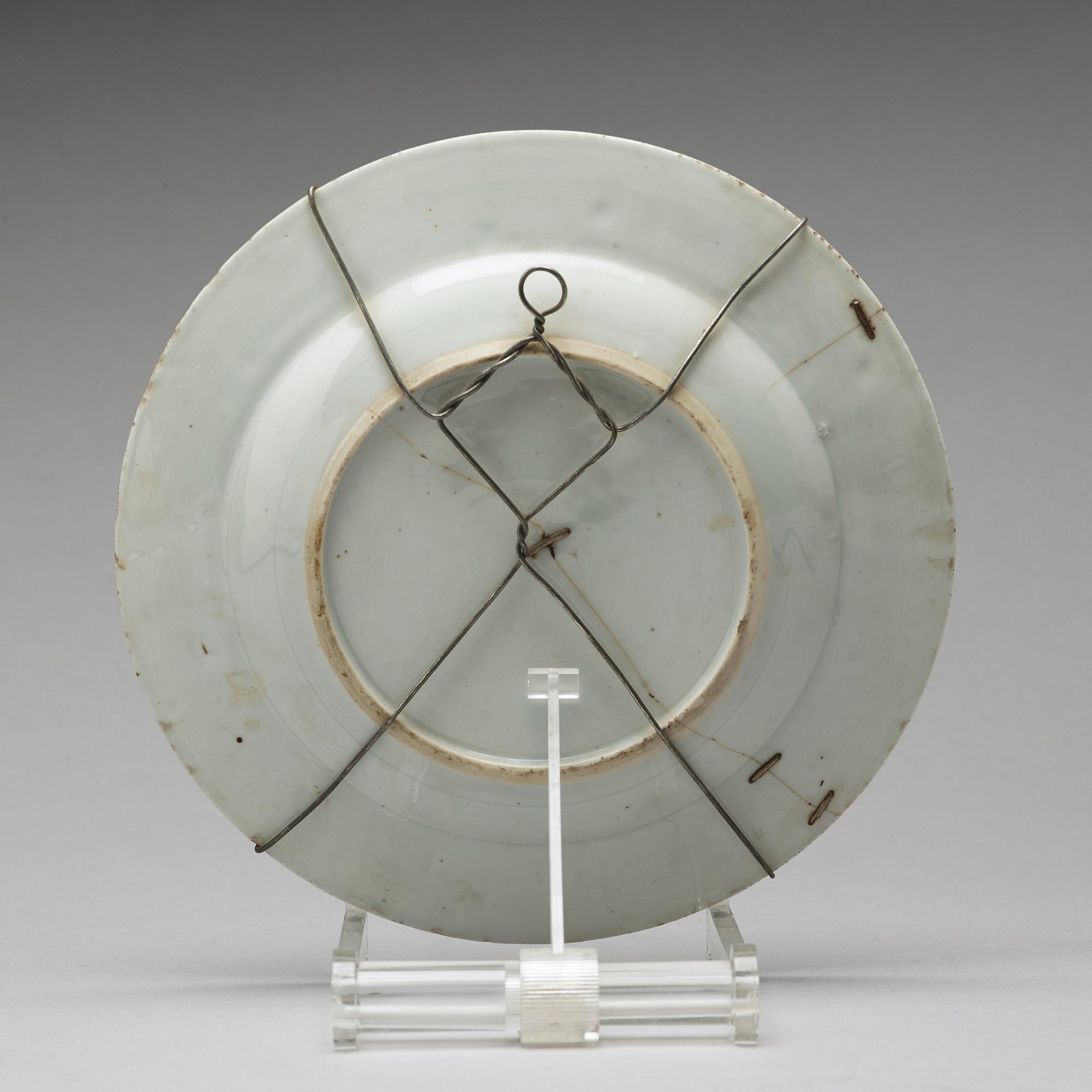 A set of four armorial dinner plates, Qing dynasty, Qianlong (1736-95).