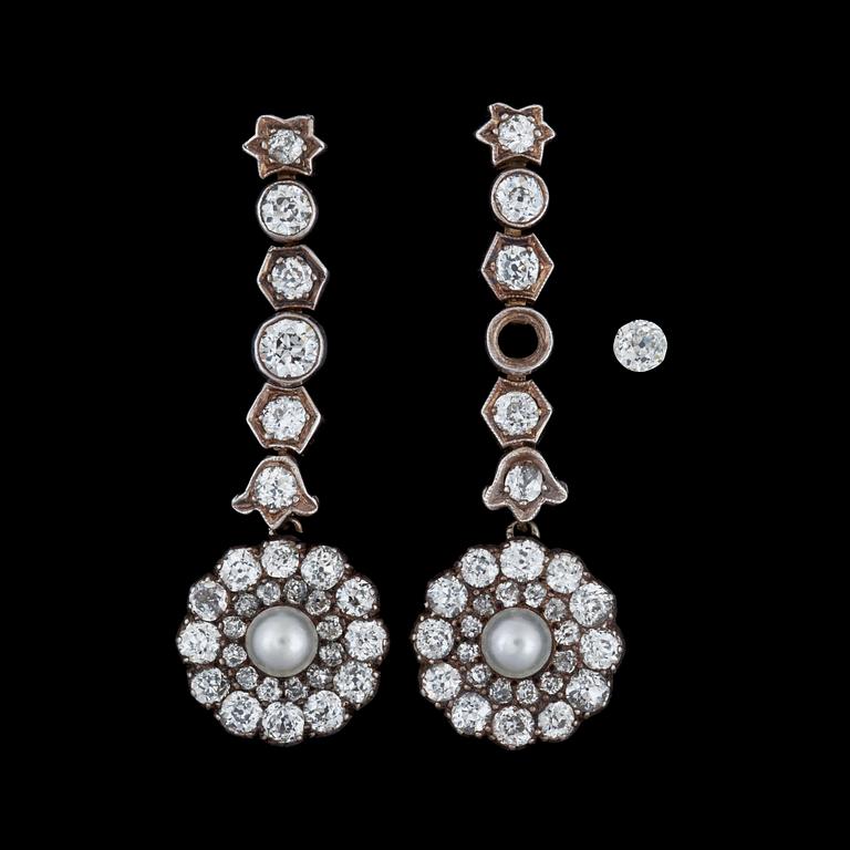 A pair of cultured pearl and diamond earrings. Total carat weight circa 2.50 cts. Circa 1900.