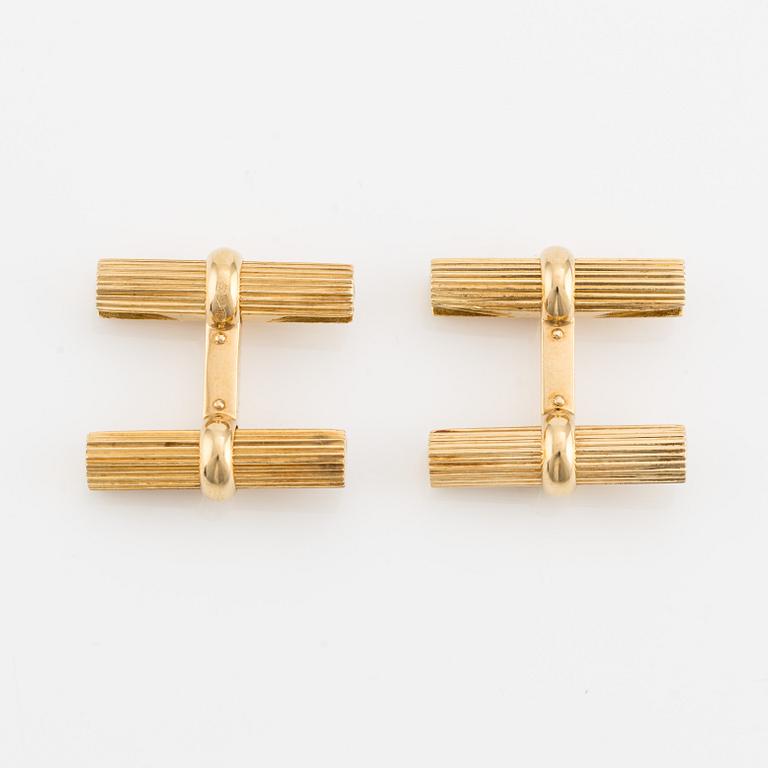 Van Cleef & Arpels, cufflinks with interchangeable parts in 18K gold and stone.
