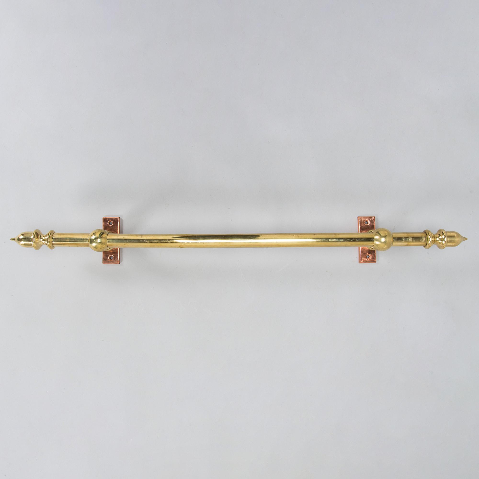 A late 20th century curtain rail / rod.