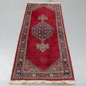 A runner, Tabriz probably, signed, ca 193 x 70 cm.