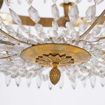 A late Gustavian thirteen-light gilt brass and cut glass chandelier, Stockholm, late 18th century.