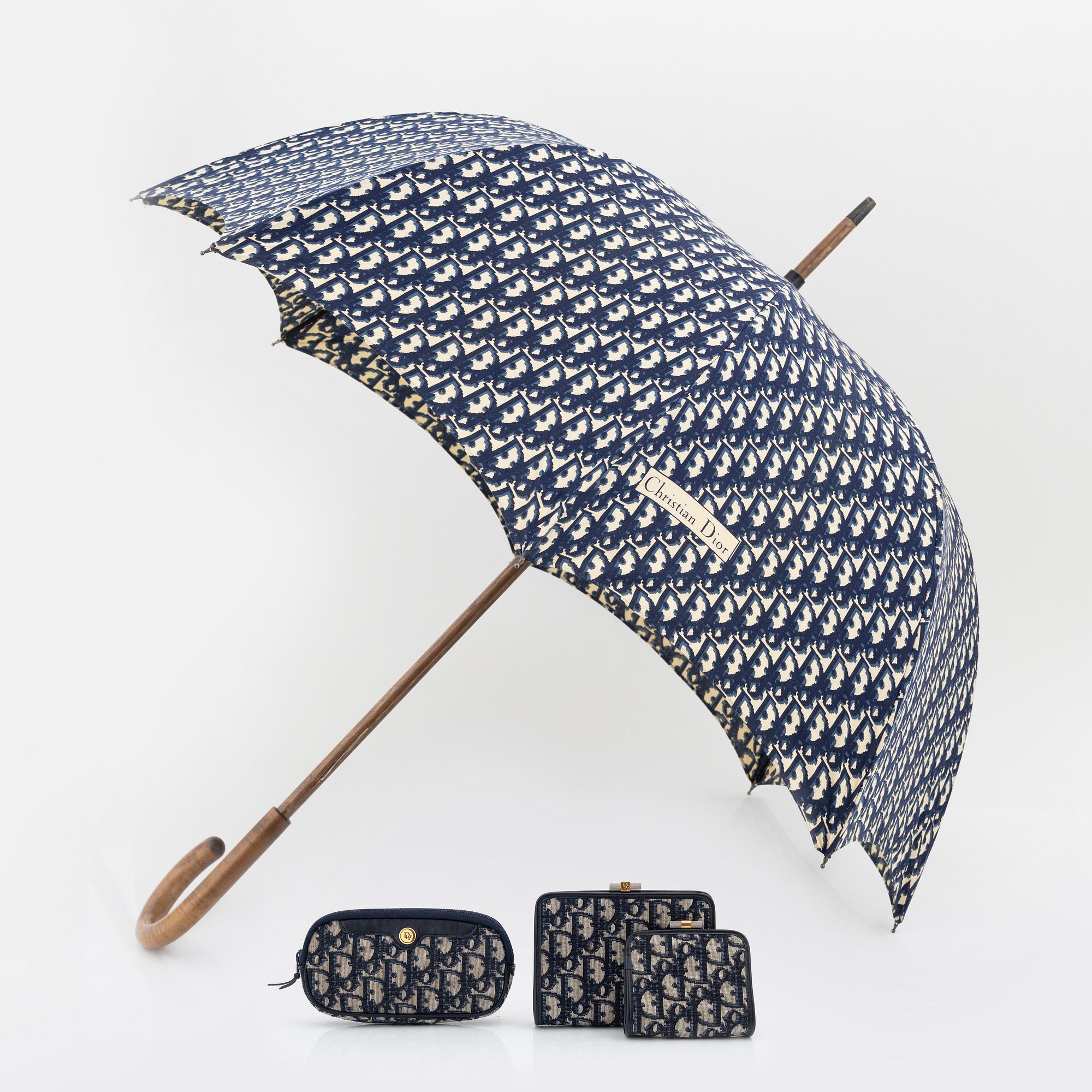 Christian Dior, paraply, glasögonfodral samt portmonnäer, 2 st.