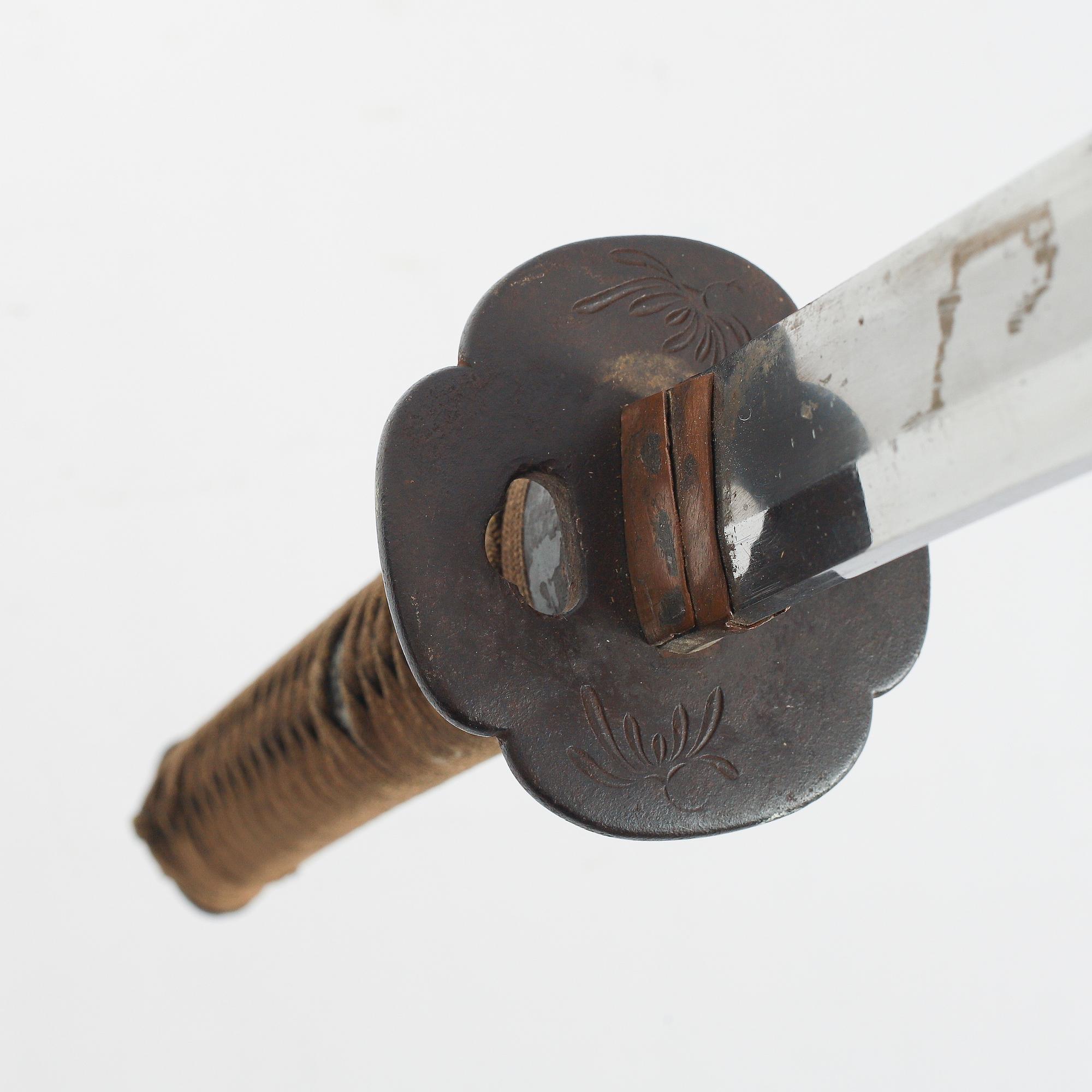 A japanese wakizashi, with 19th 20th Century mountings.