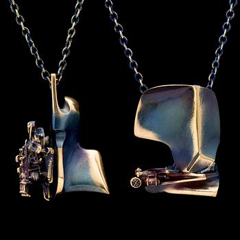 TWO BJÖRN WECKSTRÖM PENDANTS, "Starfigther" and "International Arms Inc.", fire bronze. Lapponia 1970s.