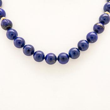 Halsband lås 18K guld och kulor av Lapis Lazuli.