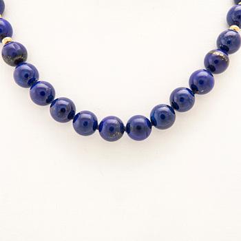 Necklace with an 18K gold clasp and Lapis Lazuli beads.