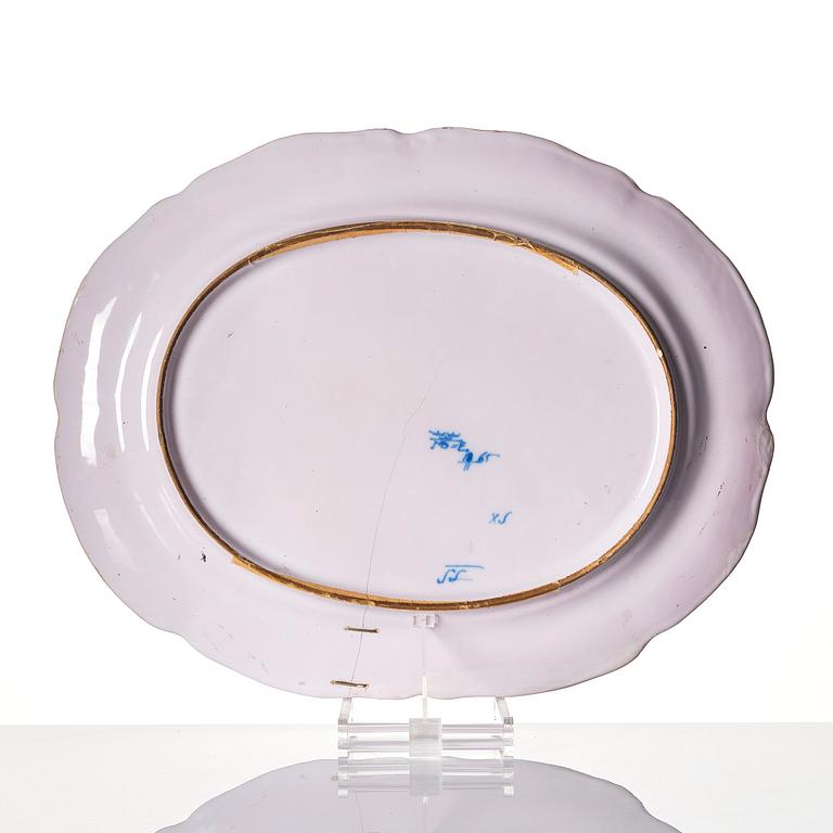A large Swedish Marieberg faience serving dish, dated 1765.