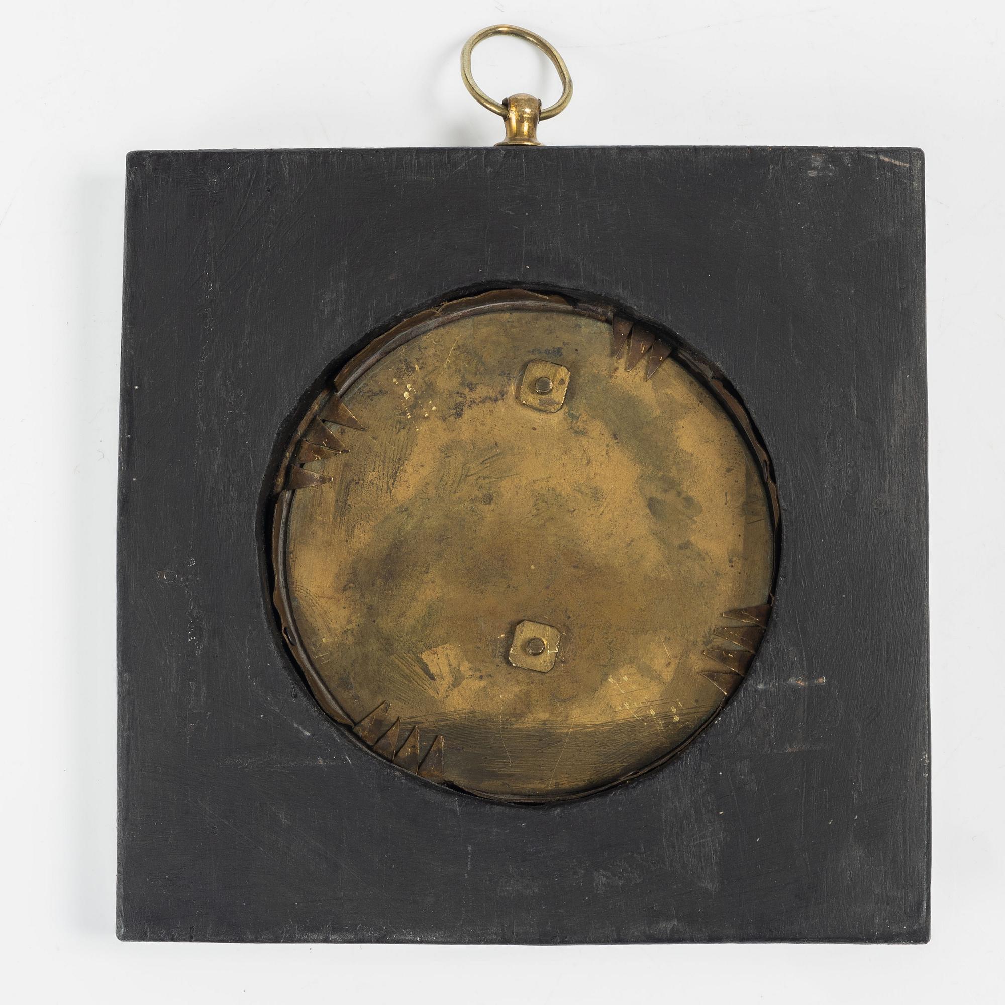 A Swedish Empire ormolu and patinated bronze portrait medallion depicting Karl XIV Johan, early 19th Century.