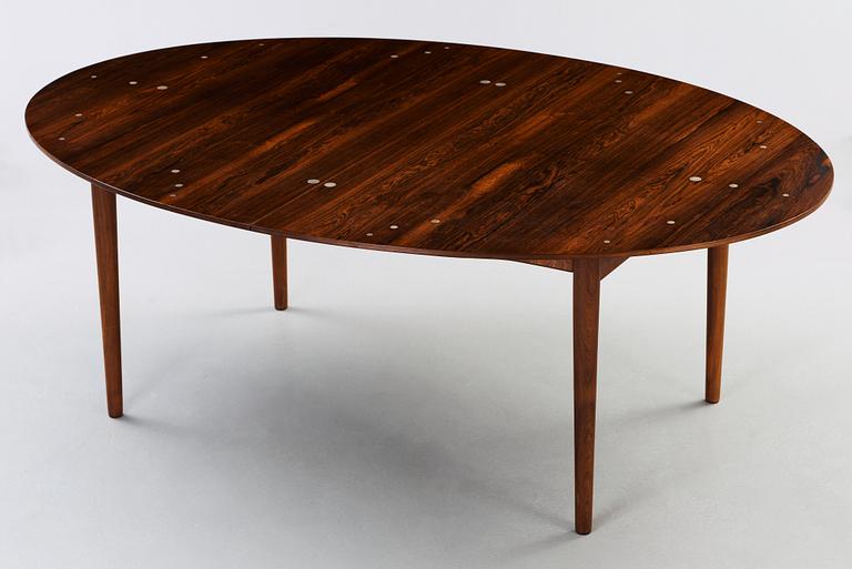 A Finn Juhl rosewood 'Judas' dining table, probably by Niels Vodder, Denmark 1960's.